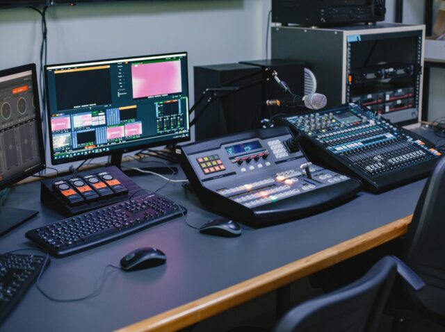 Close up of sound engineer studio with equipment